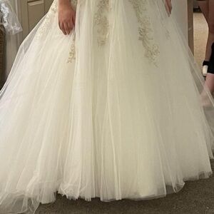 wore once, it laces up in the back, size 16, $2500 dress, selling for $800